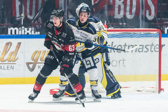 Malmö Redhawks Fredrik Händemark och HV71s Jamiro Reber