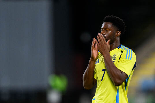Emmanuel Ekong of Sweden looks dejected