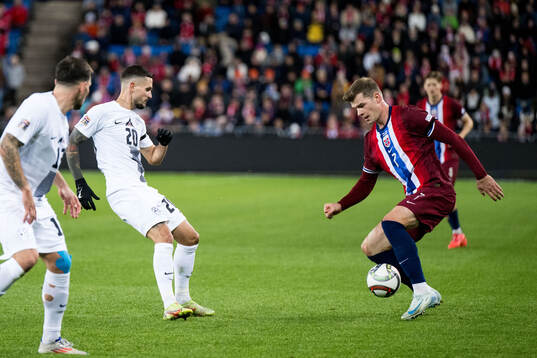 Petar Stojanovic of Slovenia and Alexander Sørloth of