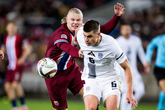 Erling Braut Haaland of Norway and Jaka Bijol of Slovenia