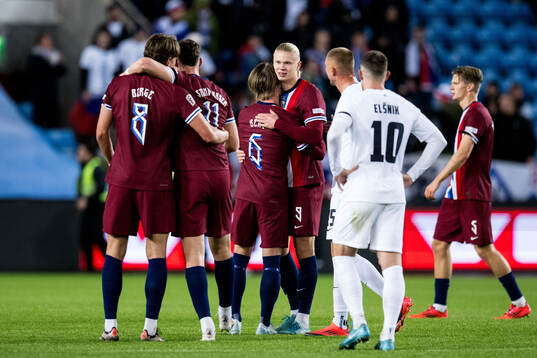 Erling Braut Haaland of Norway celebrates with team mates