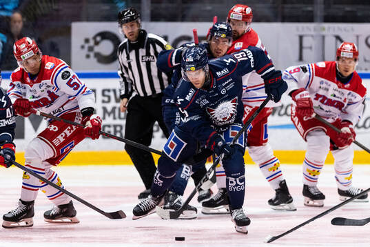 Timrås Anton Wedin och Linköpings Patrick Russell