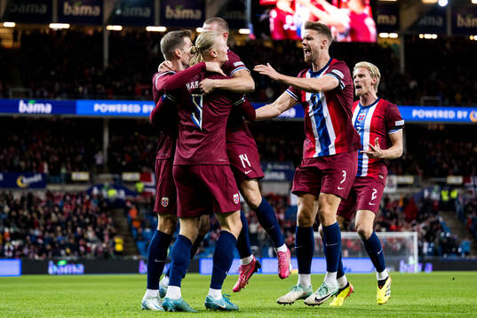Erling Braut Haaland of Norway celebrates with Kristoffer