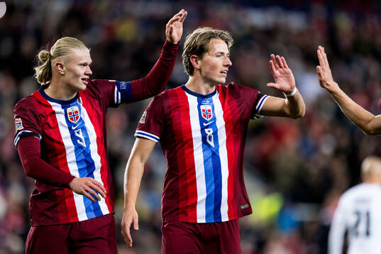 Erling Braut Haaland and Sander Berge of Norway celebrate