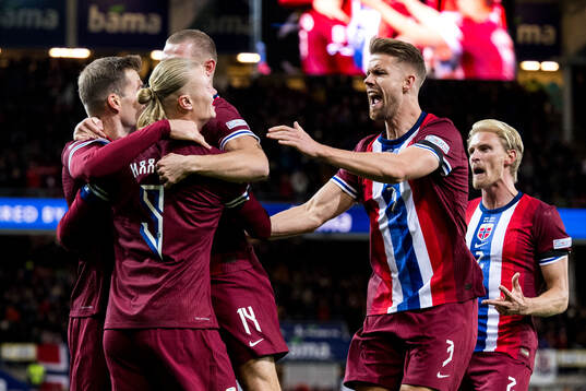 Erling Braut Haaland of Norway celebrates with Kristoffer
