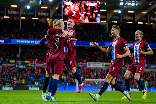 Erling Braut Haaland of Norway celebrates with teammates