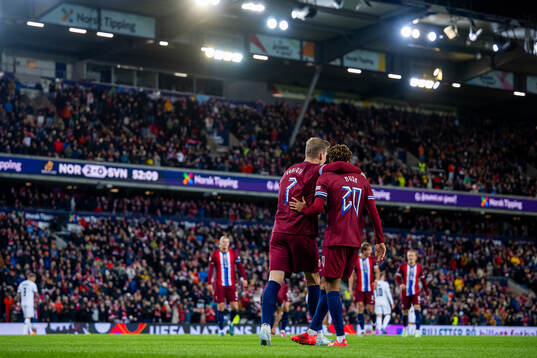 Alexander Sørloth of Norway celebrates with teammate