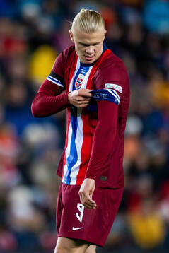 Erling Braut Haaland of Norway adjusts his captains armband