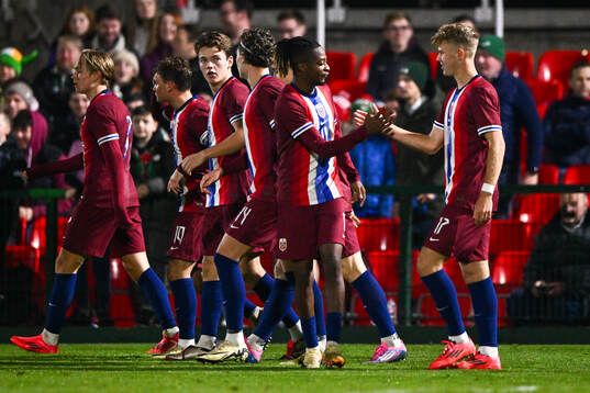 Joel Mvuka and Sindre Walle Egeli of Norway celebrate