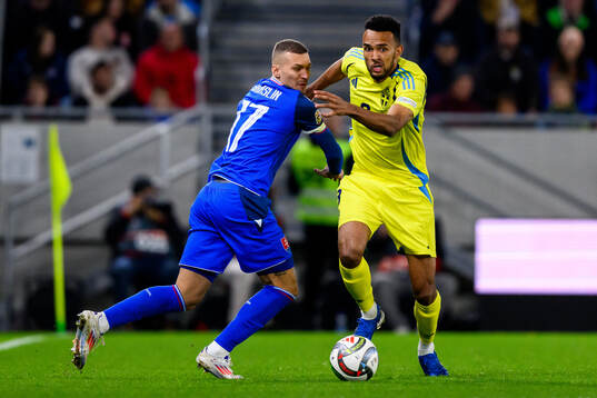 Lukás Haraslin of Slovakia and Alex Douglas of Sweden