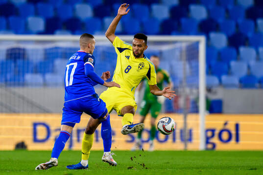 Lukás Haraslin of Slovakia and Alex Douglas of Sweden