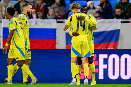 Anton Salétros and Ken Sema of Sweden celebrate