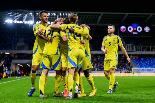Yasin Ayari of Sweden celebrate with teammates