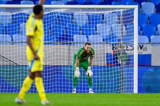 goalkeeper Viktor Johansson of Sweden looks dejected