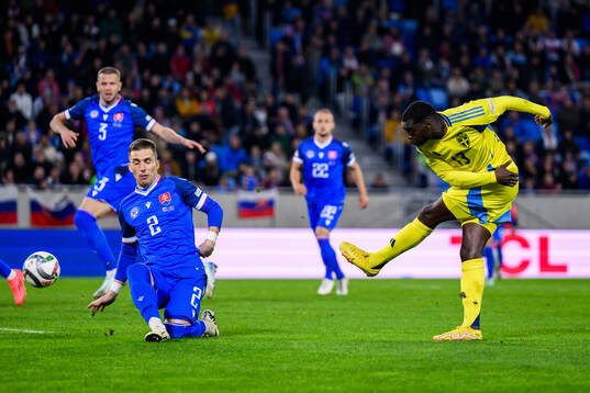 Peter Pekarik of Slovakia and Ken Sema of Sweden
