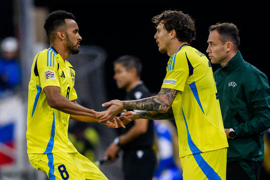 Alex Douglas and Victor Nilsson Lindelöf of Sweden