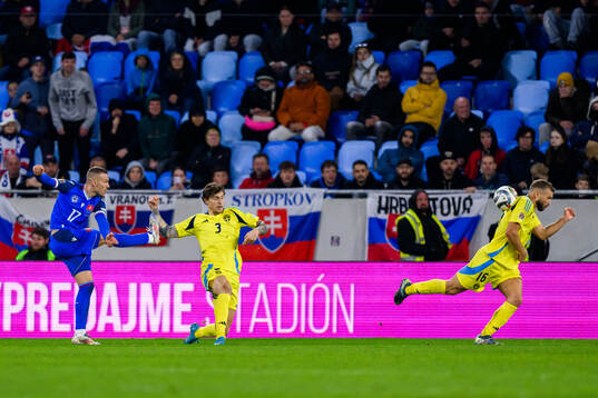 Lukás Haraslin of Slovakia and Victor Nilsson Lindelöf