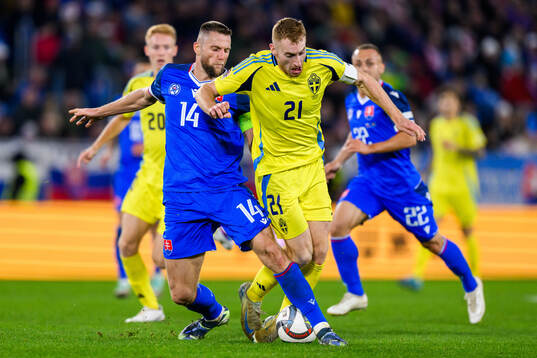 Milan Skriniar of Slovakia and Dejan Kulusevski of Sweden