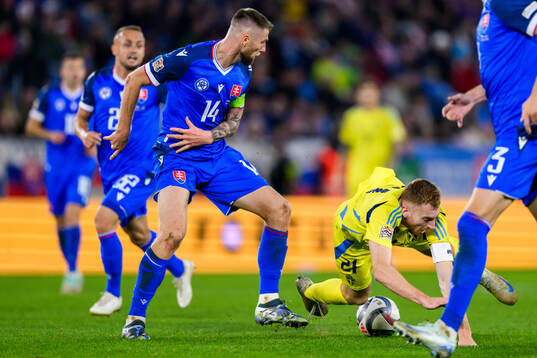 Milan Skriniar of Slovakia and Dejan Kulusevski of Sweden