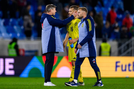 head coach Jon Dahl Tomasson and Jesper Karlström of Sweden