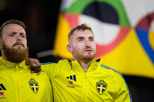 Goalkeeper Viktor Johansson and Dejan Kulusevski of Sweden