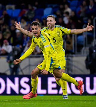 Yasin Ayari and Gabriel Gudmundsson of Sweden celebrate the