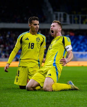 Yasin Ayari and Dejan Kulusevski of Sweden celebrate the