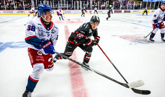 IK Oskarshamns Axel Landén och Nybros Maksim Semjonov