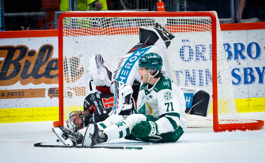 Örebros målvakt Jhonas Enroth och Färjestads Viktor Lodin