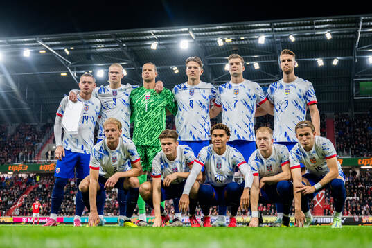 The starting eleven of Norway pose for a team photo