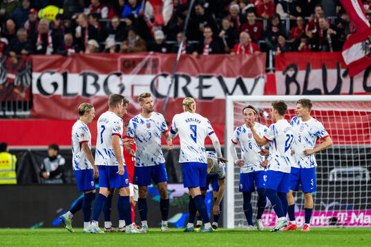 Kristoffer Ajer and teammates of Norway look dejected