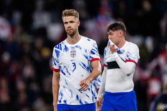 Kristoffer Ajer of Norway looks dejected
