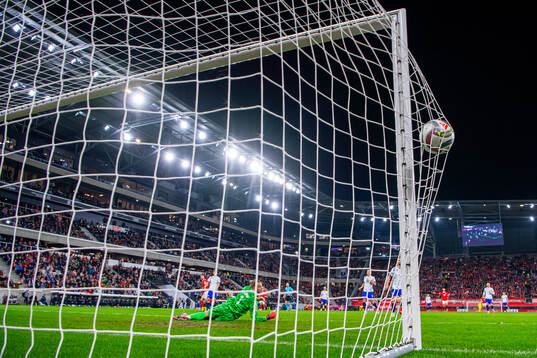 Marko Arnautovic of Austria scores the 1-0 goal past