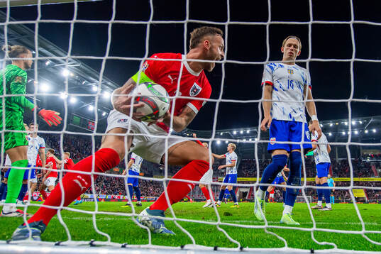 Marko Arnautovic of Austria and Marcus Holmgren Pedersen of