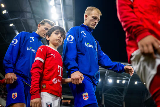 Andreas Hanche-Olsen of Norway enters the pitch