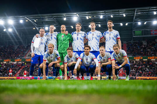 The starting eleven of Norway pose for a team photo