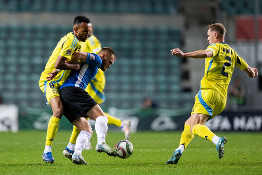 Alex Douglas and Emil Krafth of Sweden against Alex