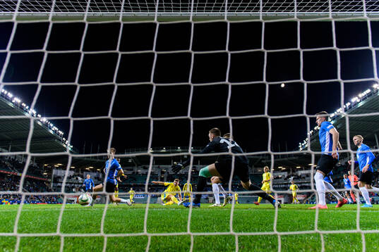 Viktor Gyökeres of Sweden scores 0-3 behind goalkeeper