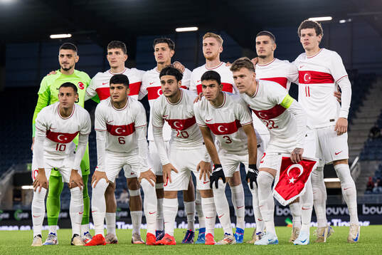 The starting eleven of Turkey poses for a team group photo
