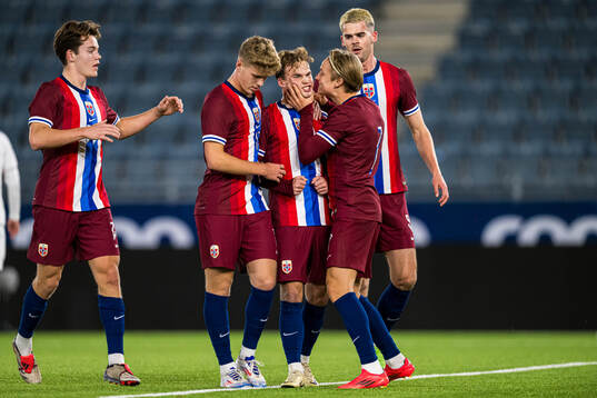 Kristian Malt Arnstad of Norway celebrates