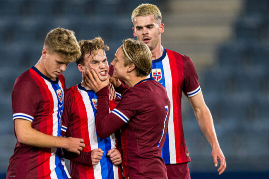 Kristian Malt Arnstad of Norway celebrates