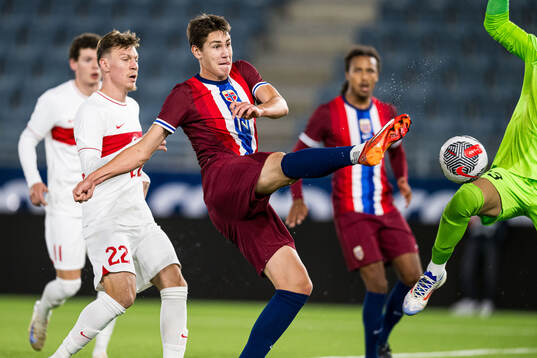 Eivind Fauske Helland of Norway missing a chance to score