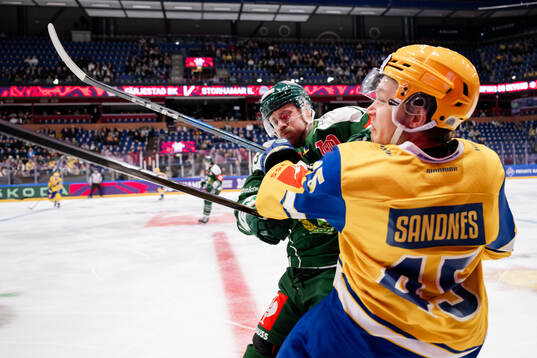 Joel Kellman of Färjestad  and Axel Sandnes of Storhamar