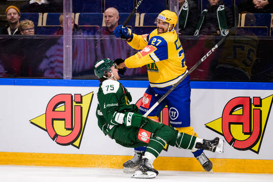 Jeremy Groleau of Färjestad  and Andreas Martinsen of