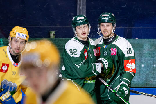 Lucas Forsell and Marcus Westfält of Färjestad  celebrate