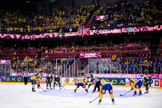 Players of Färjestad  and Storhamar and supporters of