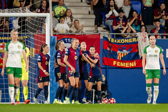 Fridolina Rolfö and Ewa Pajor of Barcelona celebrate
