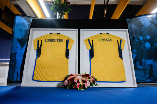 Jerseys with the names of the two victims of the terror