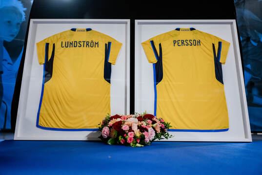 Jerseys with the names of the two victims of the terror