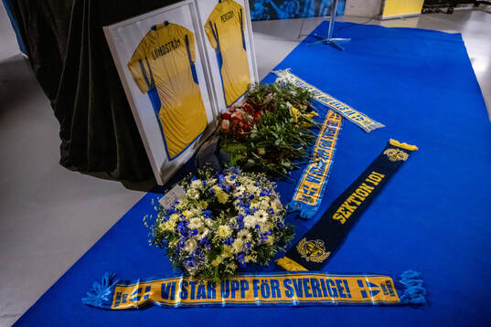Jerseys with the names of the two victims of the terror